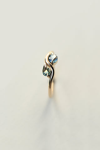 PAIRED OVAL AND PEAR CUT SAPPHIRE RING